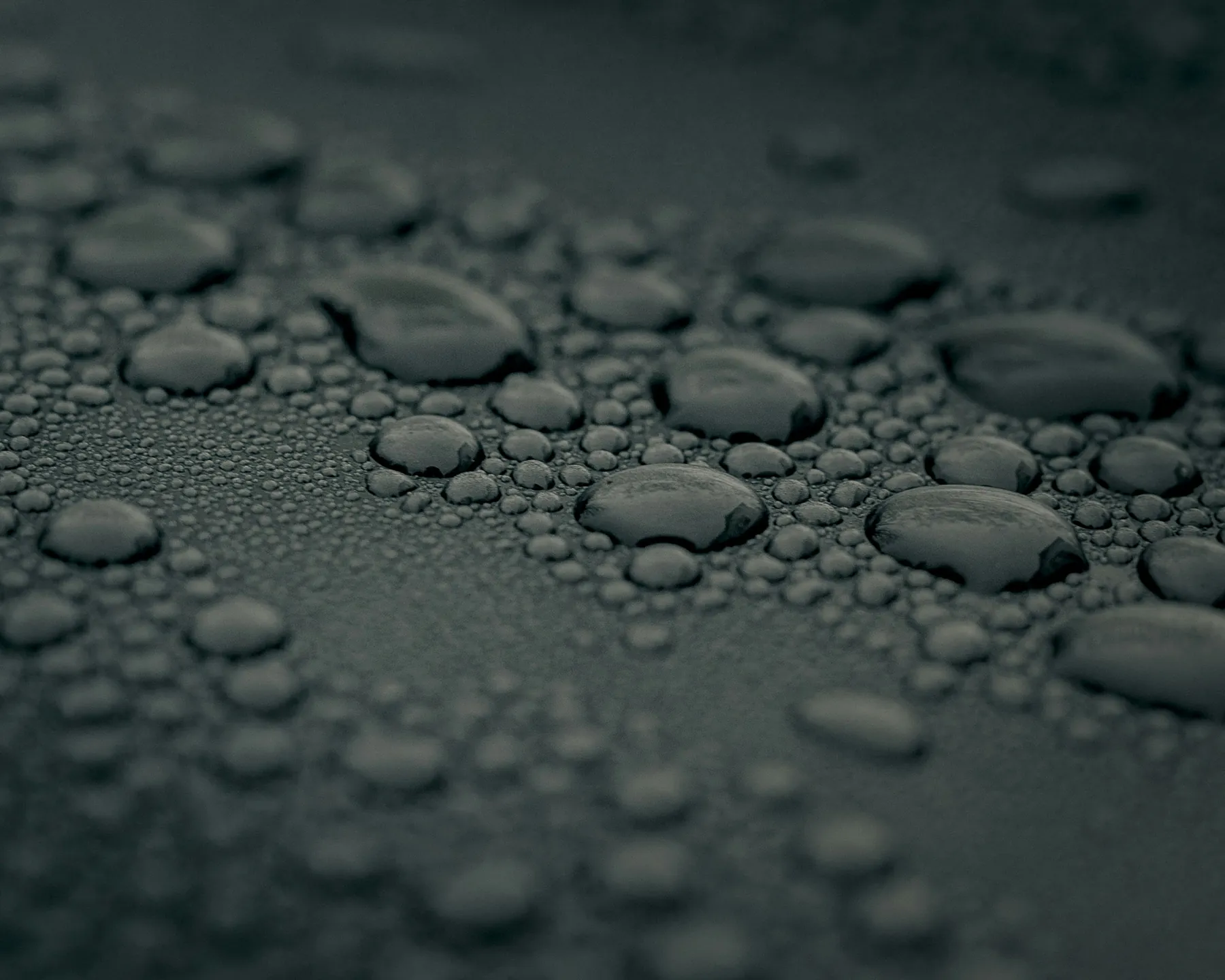 Condensation droplets on a grey metal surface