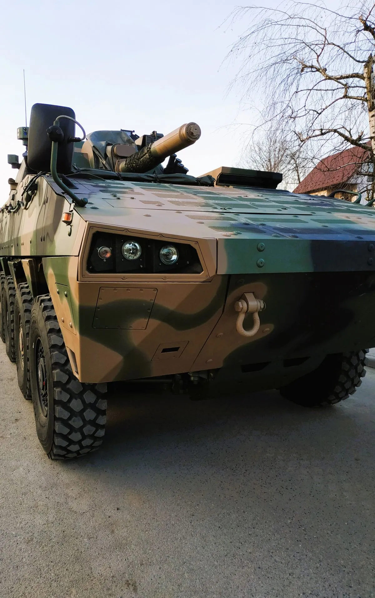Military vehicles parked in desert terrain