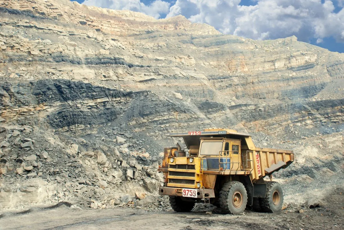 Open-pit mine with haul trucks and excavators