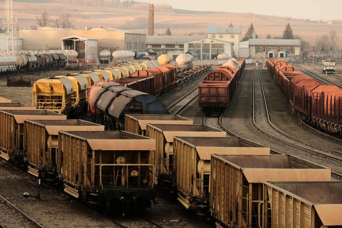 Freight train on railway tracks in daylight